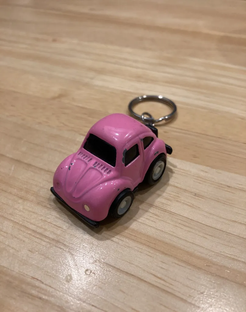 Free W/ Trade - Mini Pink Car Keychain photo 1