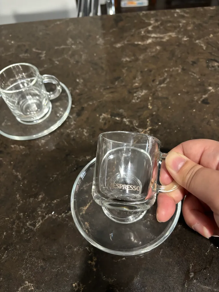 Nespresso cups and saucers  photo 1
