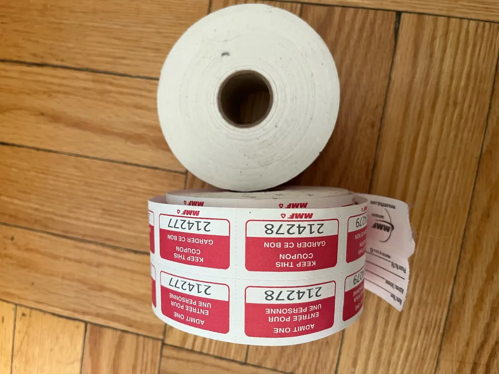 Two rolls of raffle tickets.  photo 1