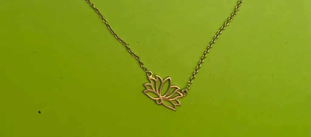 Dainty gold lotus necklace photo 1