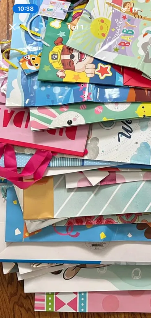 A FEW GIFT BAGS ASSORTED SIZES AND PRINTS photo 1