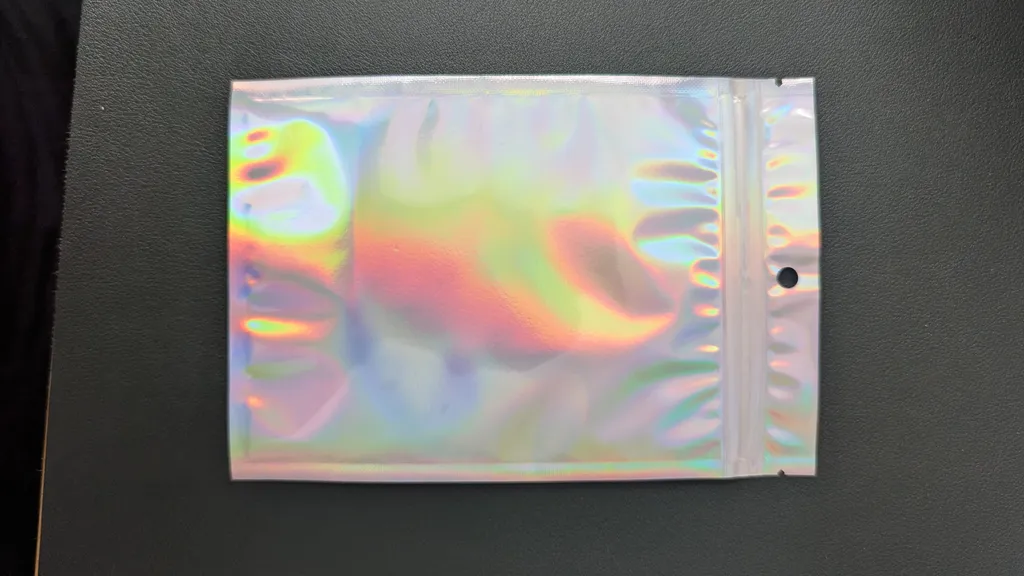 About 40 of these new holographic sealing bags  photo 1