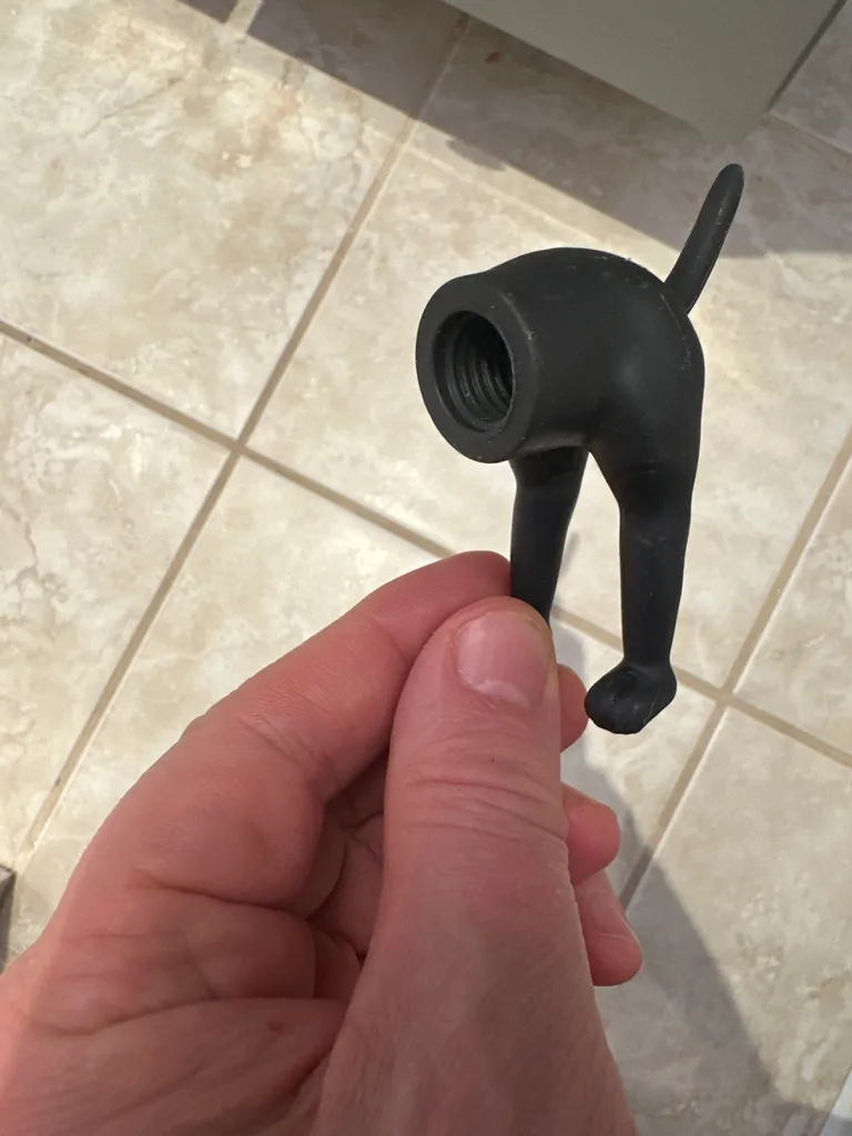 Dog Butt toothpaste cap/dispenser photo 1