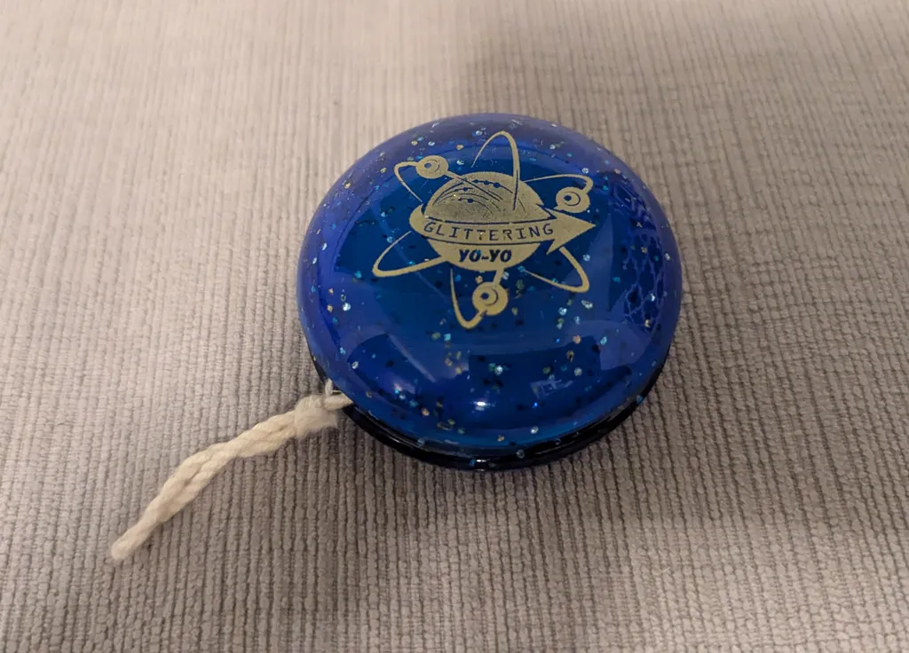 Blue and Gold Glittering Yo-Yo photo 1