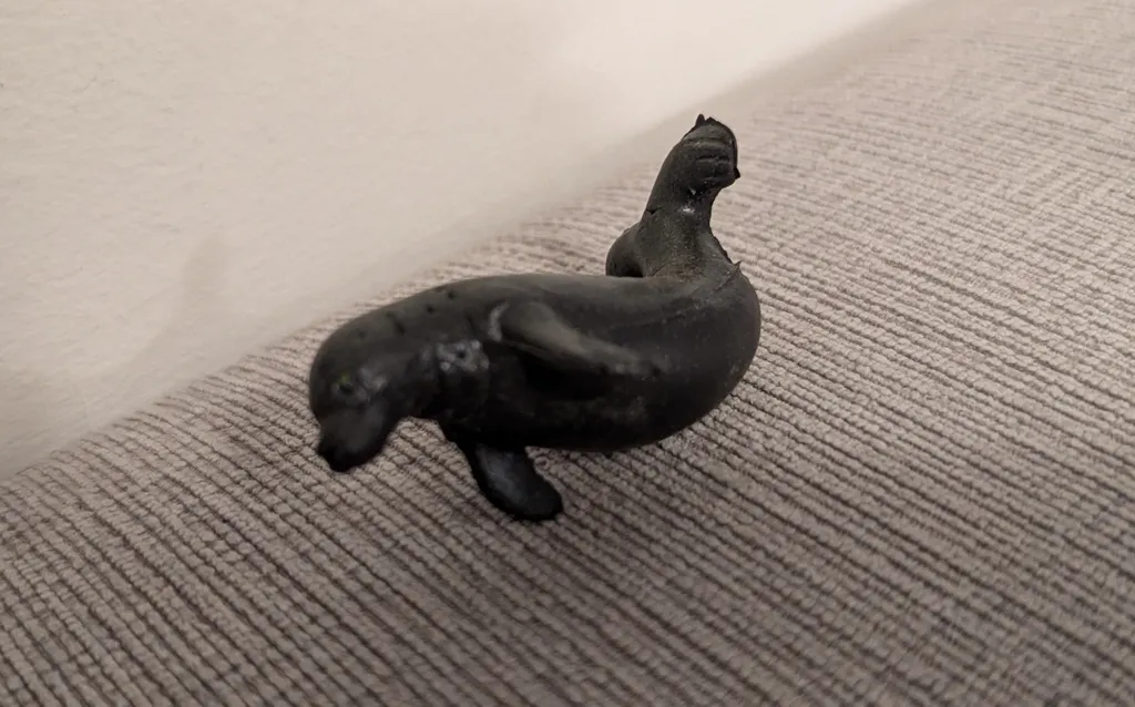 Black Plastic Seal Toy photo 1