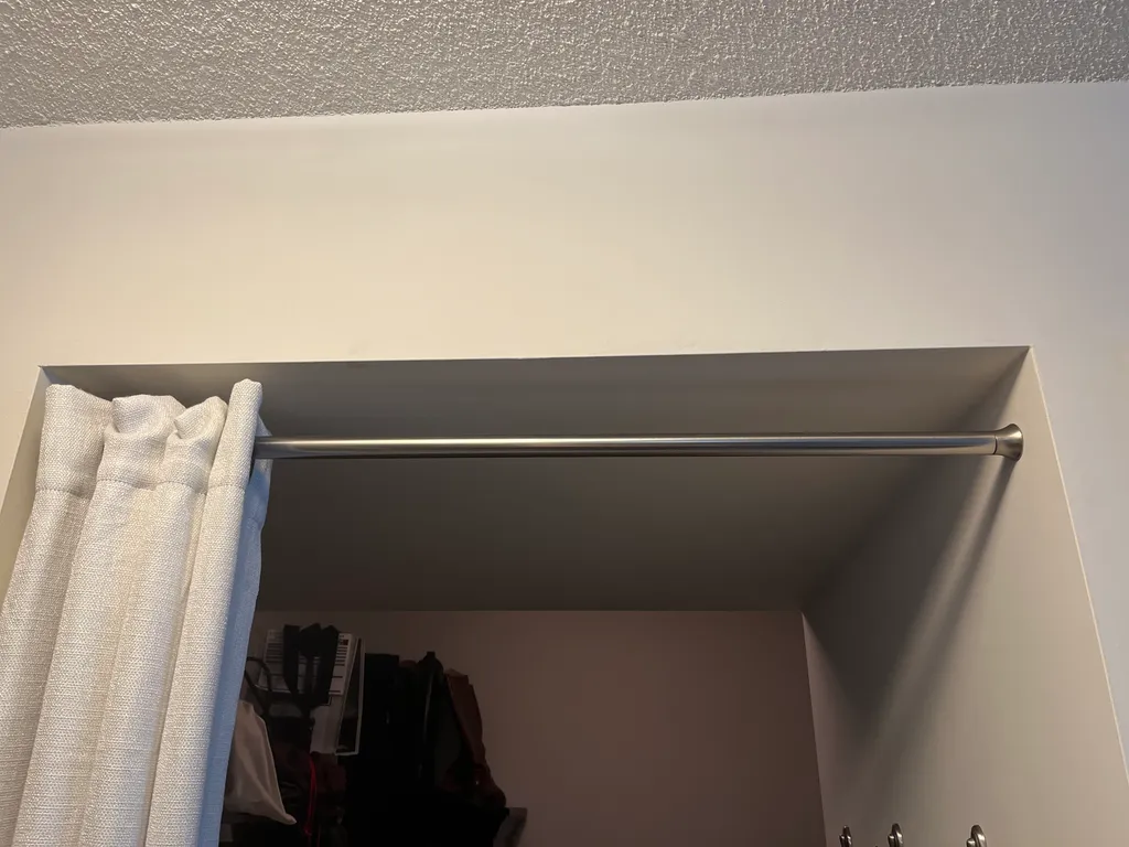 Tension rod for curtains photo 1