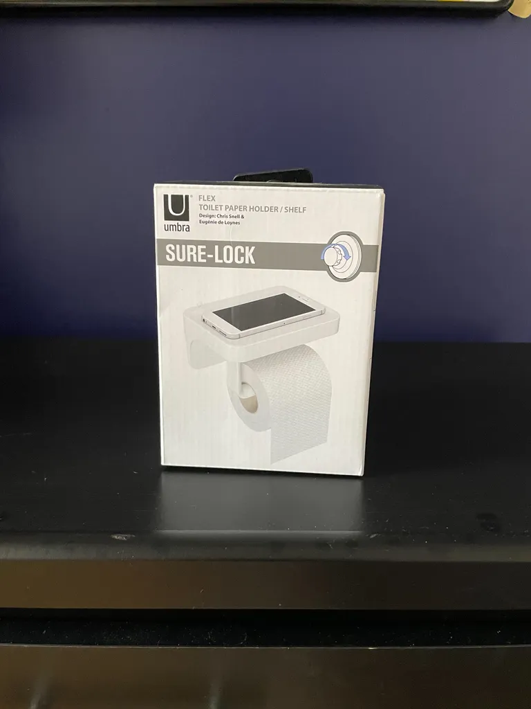 Toilet paper phone holder  photo 1