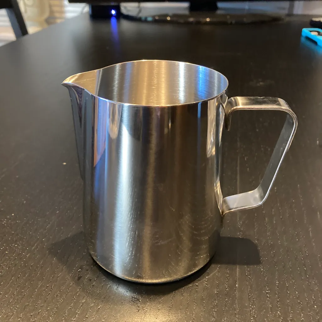 Stainless steel milk container photo 1