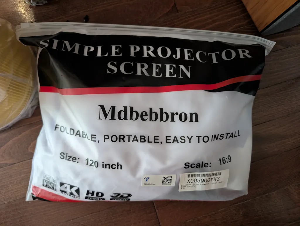 Never used projector screen  photo 1