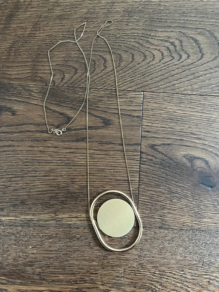 Gold Tone Pendant Necklace photo 1