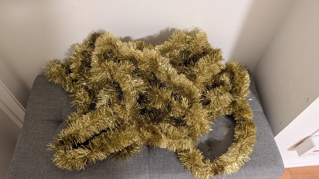 Gold Tinsel Holiday Garland photo 1