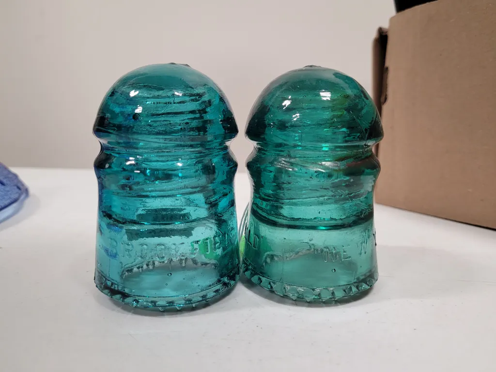 Two blue glass insulaters photo 1