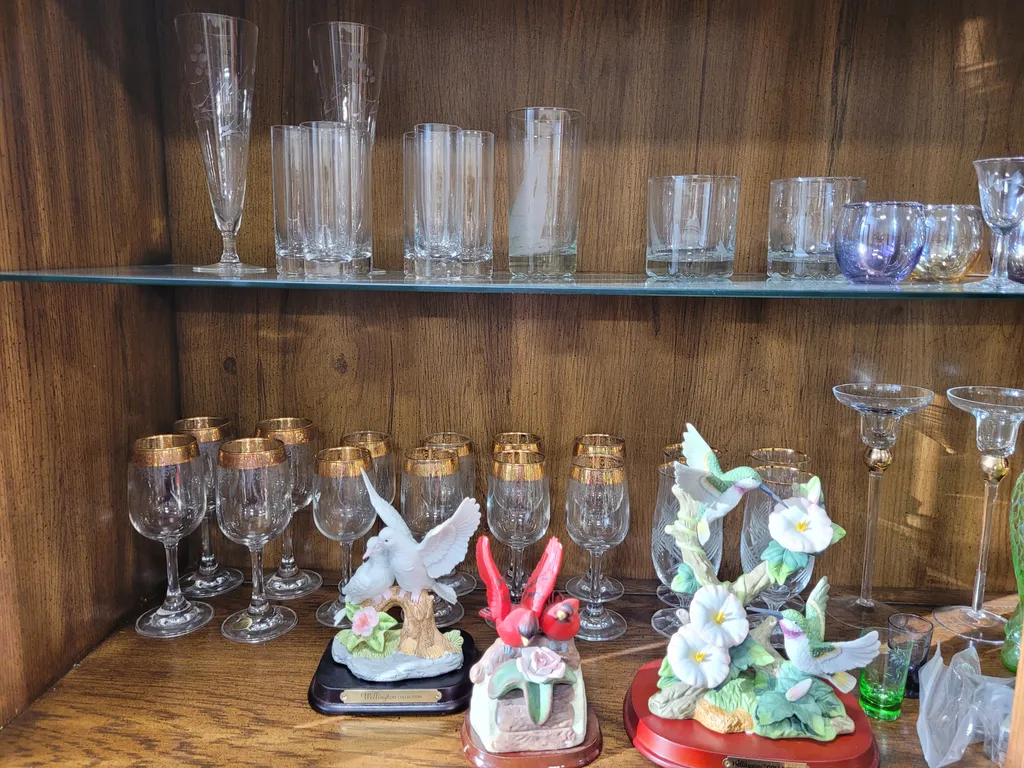Bird figures and glassware  photo 1
