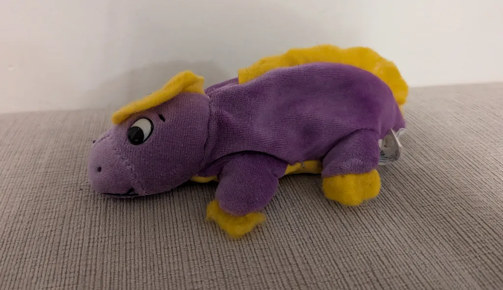 Purple and Yellow Dinosaur Plush Toy photo 1