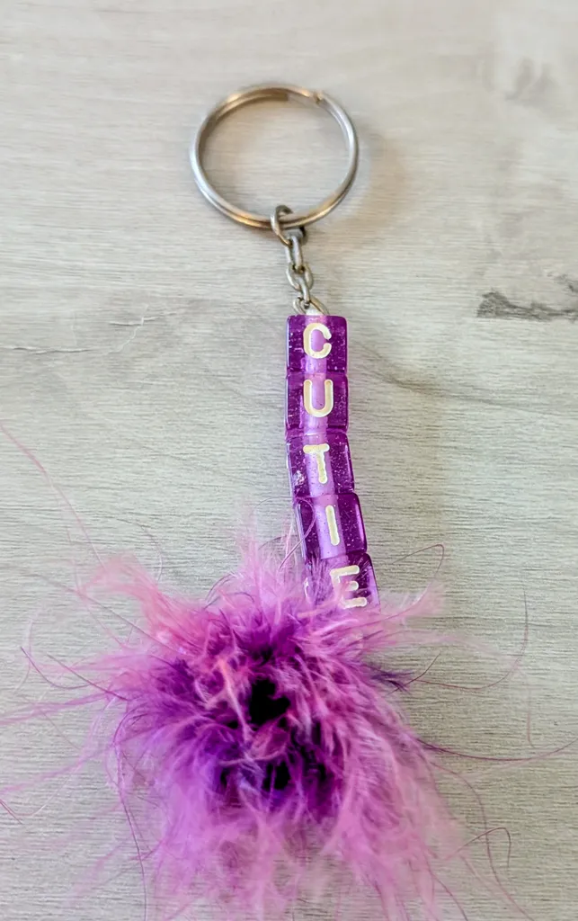 Brand New Purple 'Cutie' Keychain with Feathers photo 1