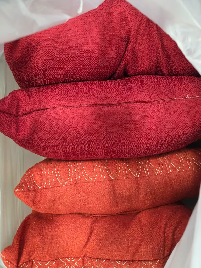 2 red 2 orange pillows photo 1