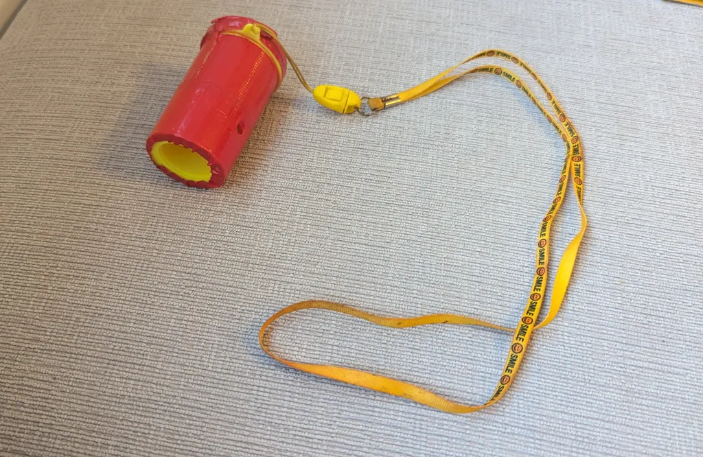 Red and Yellow Noisemaker  photo 1
