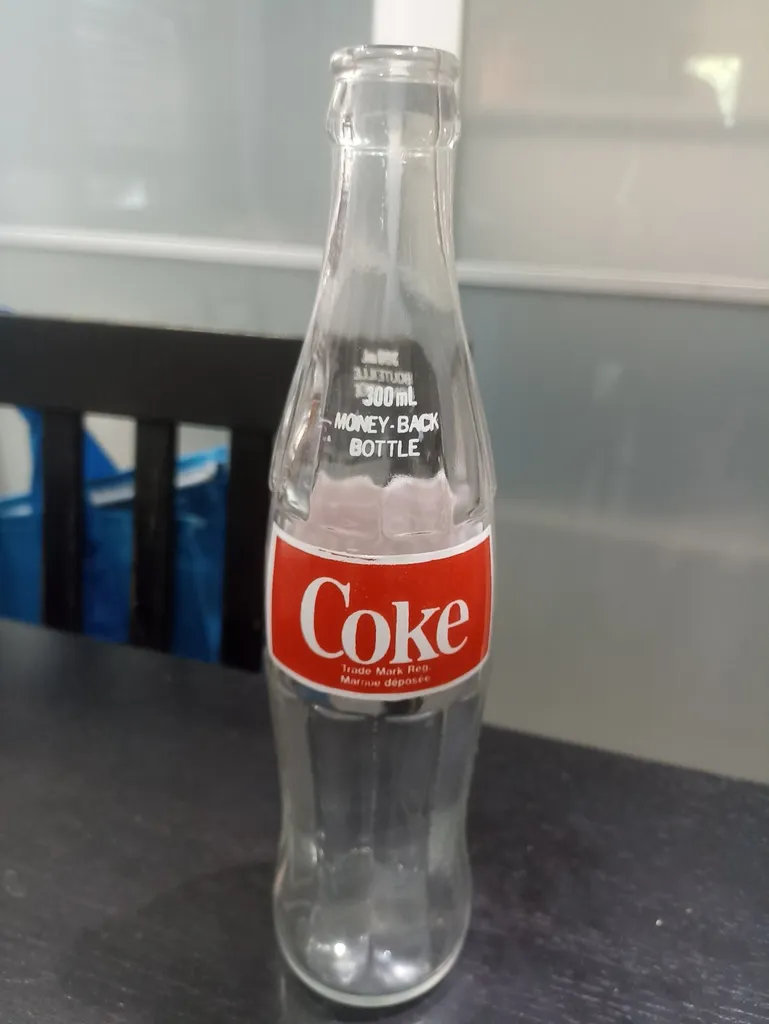 Vintage Coca-Cola bottle photo 1