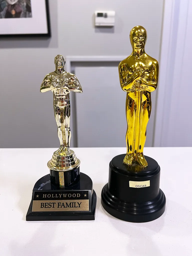 2 Oscar Statues photo 1