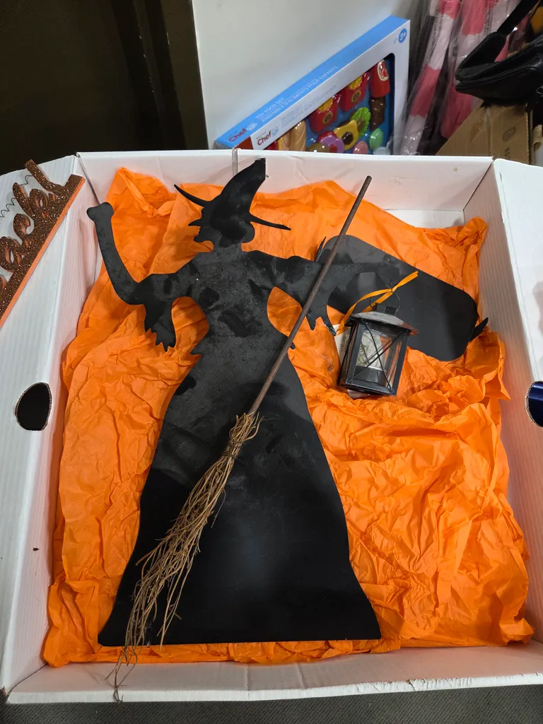 Black silhouette metal witch  photo 1