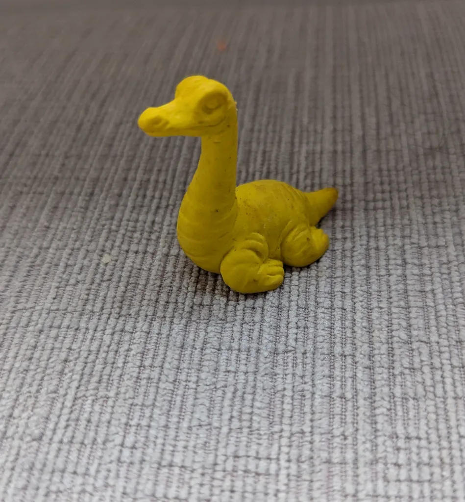 Vintage Yellow Dinosaur Toy photo 1