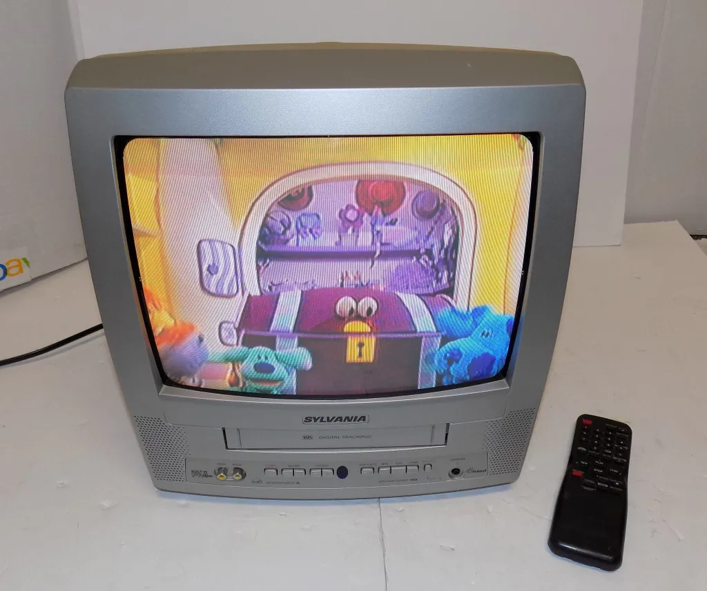Small CRT tv with built in dvd or vcr. photo 1