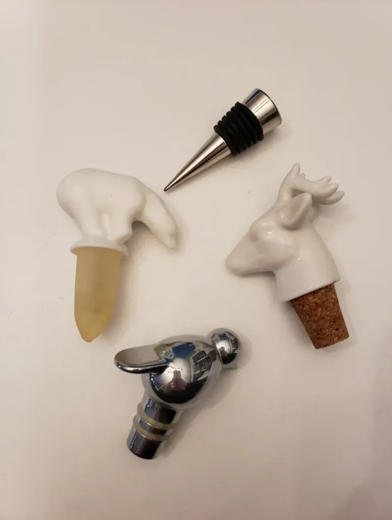 4 wine bottle stoppers photo 1