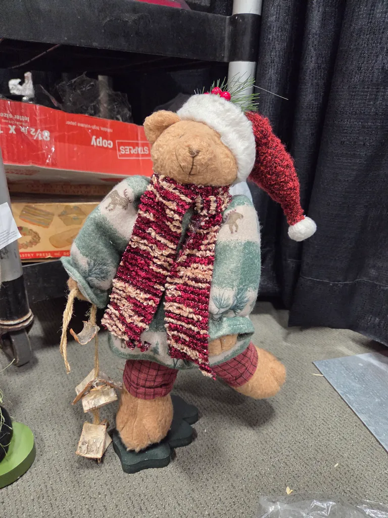 Bear that stands on one leg.  photo 1