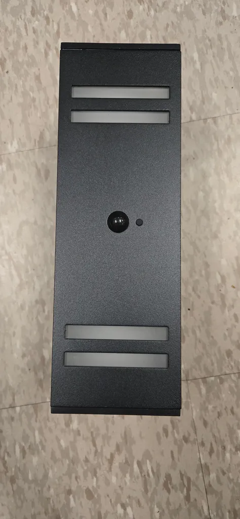 Outdoor motion sensing sconce light photo 1