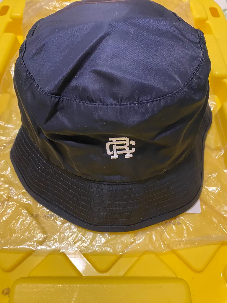 Namebrand: Reigning Champ Satin Bucket Hat photo 1