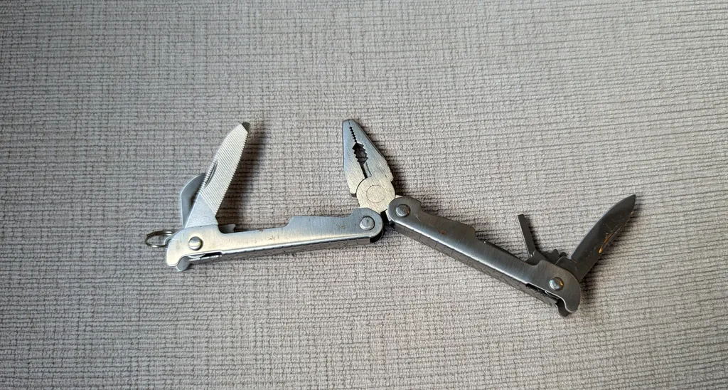 Multi-Use Camping Or Pocket Travel Tool photo 1