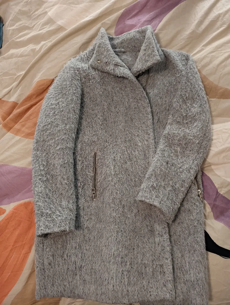 Shaggy grey winter coat photo 1