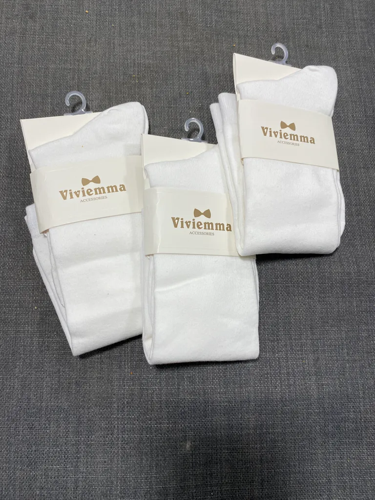 White knee length socks in packaging  photo 1