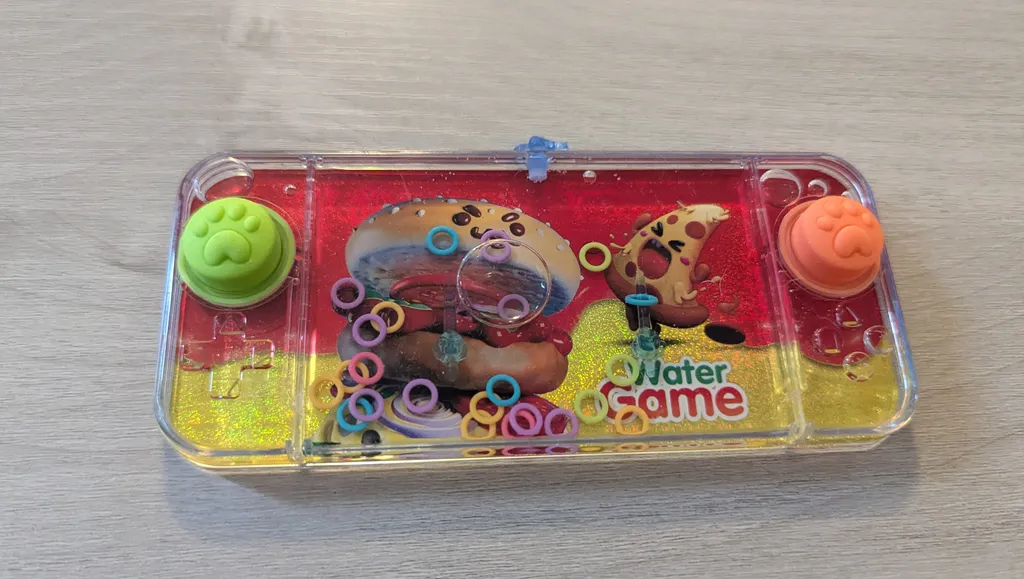 Brand New Handheld Water Game Toy  photo 1