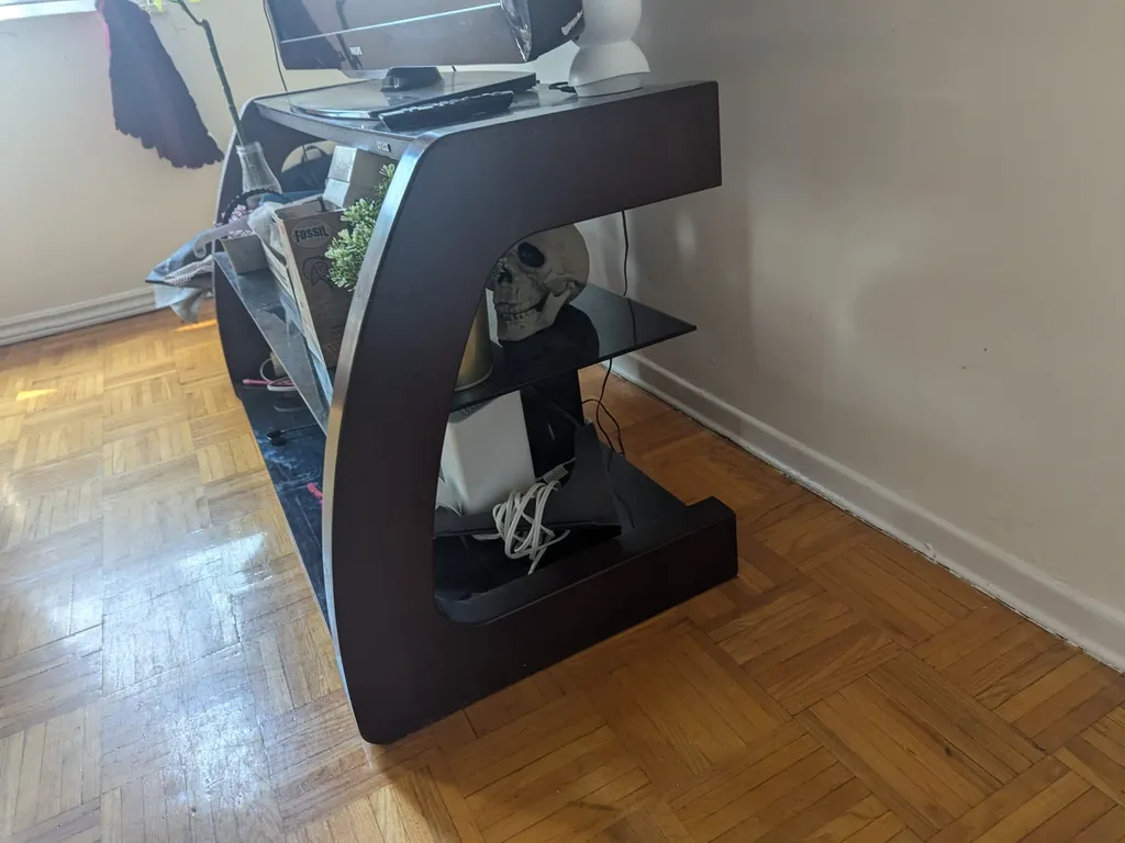 A table which can be used as a TV stand photo 1