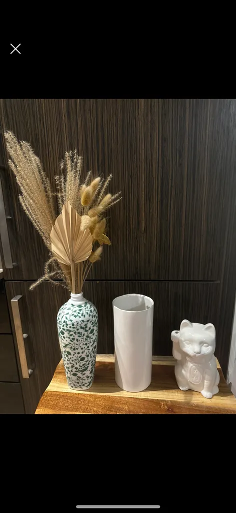 Dried floral arrangement and decorative pieces photo 1