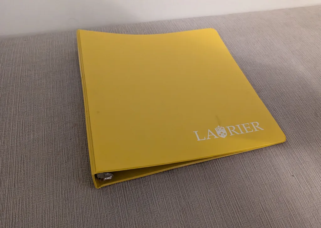 Yellow Binder with Laurier Logo  photo 1