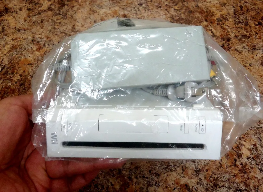 Wii Video game bundle Console 2 nunchucks 1 controller 7 games photo 1