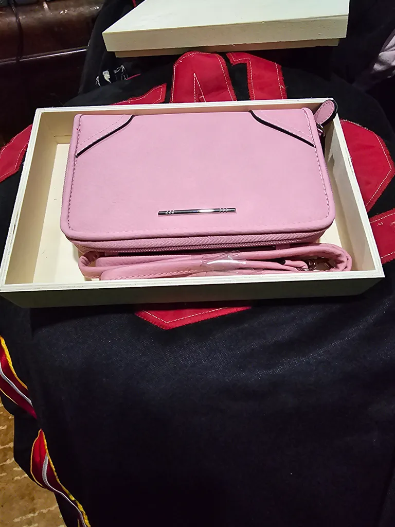 Brand new pink clutch with strap never used photo 1