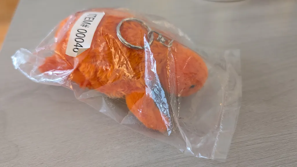 Brand New in Package Orange Turtle Plush Keychain - Gift photo 1