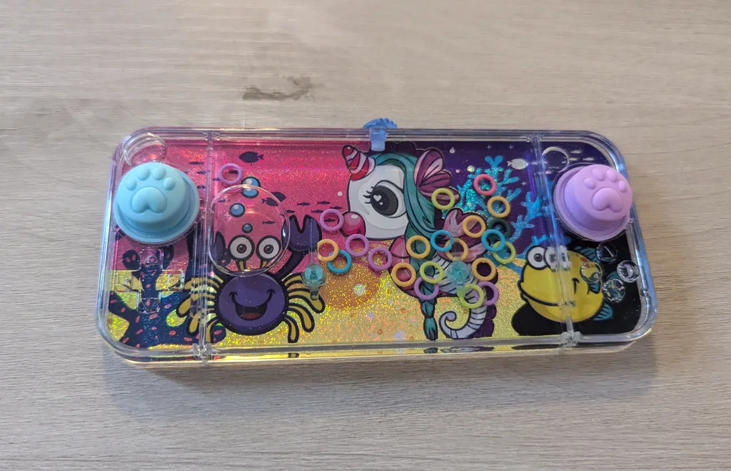 Brand New Handheld Water Toy Game photo 1