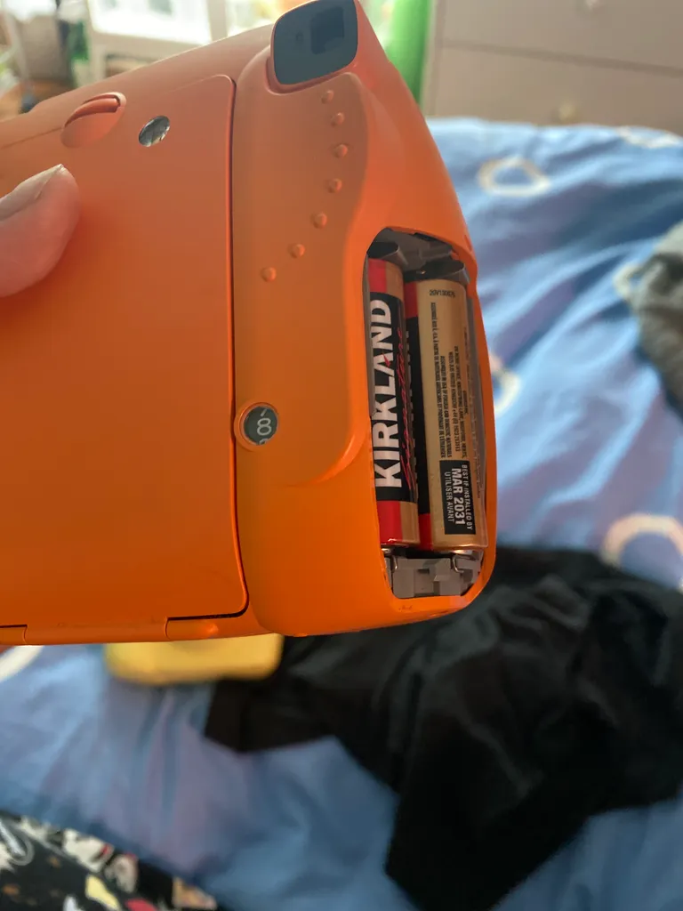 iso an instax camera battery cover photo 1