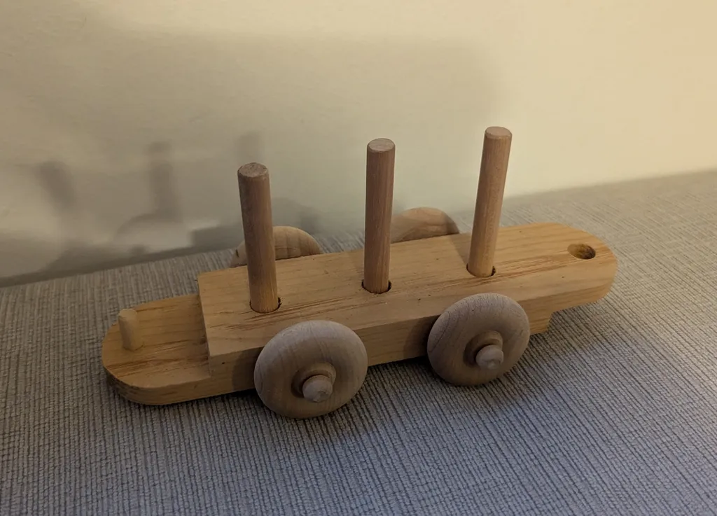 Wooden Toy Train with Peg Stacking photo 1