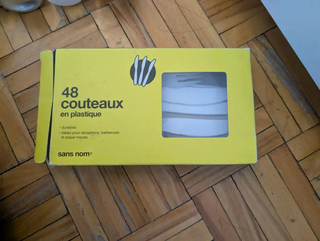 Plastic forks and knives (1/2 full)  photo 1