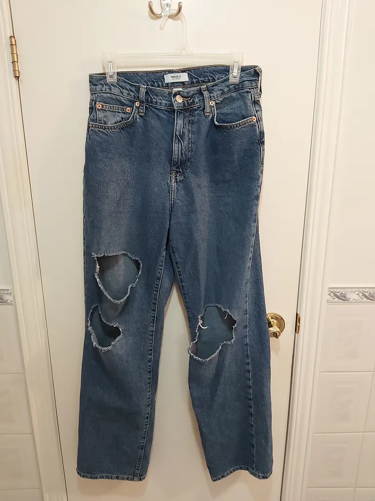 Ripped mom style jeans photo 1