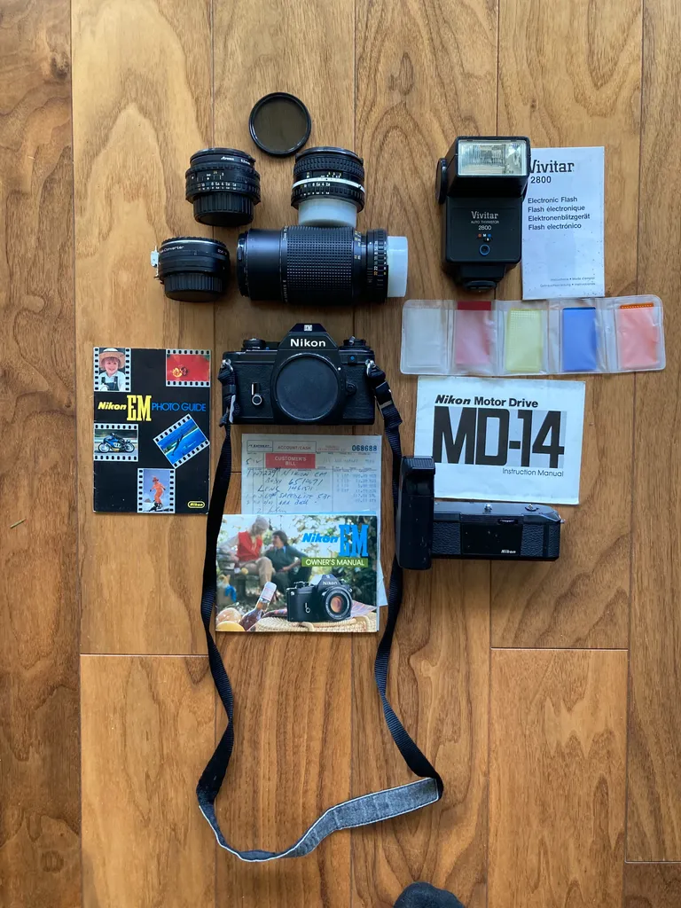  Nikon Em 35mm SLR camera kit + 3 lens setup photo 1