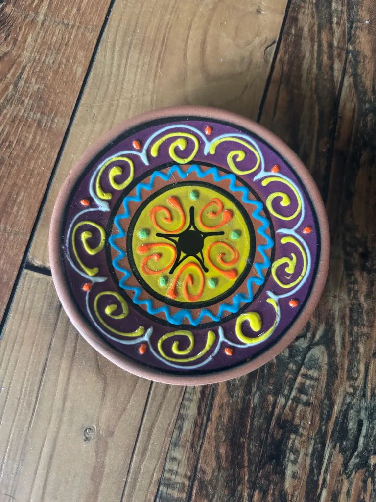 Purple and Yellow Ceramic Art photo 1