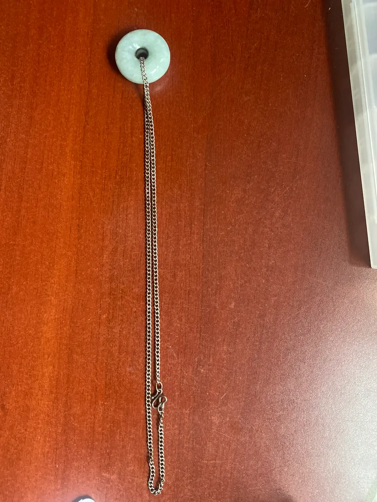 Large jade circle with silver necklace. photo 1