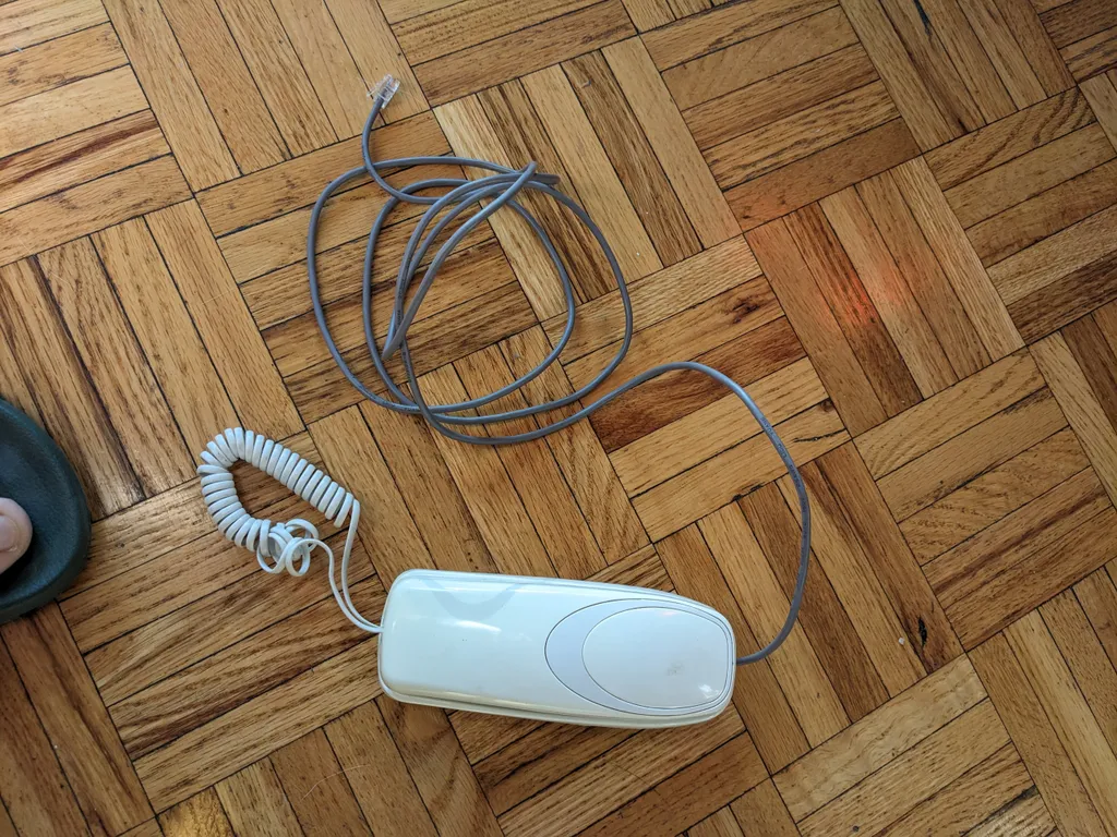 Basic white phone  photo 1