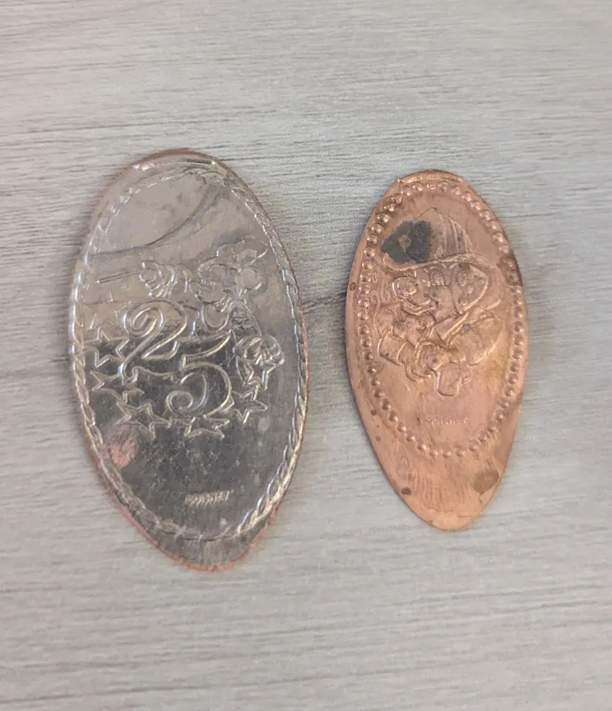 Two Souvenir Pressed Coins photo 1